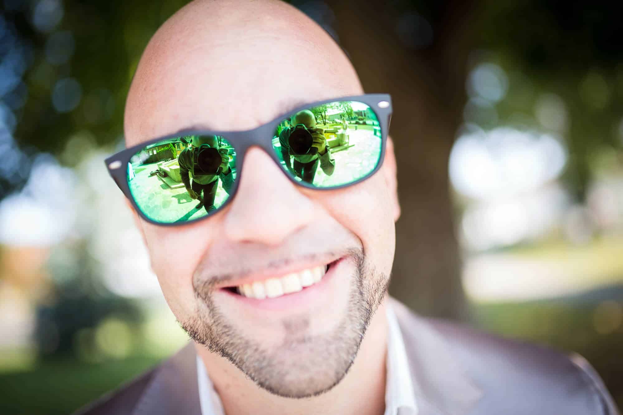 bald-man-wearing-sunglasses The Benefits of Scalp Micropigmentation