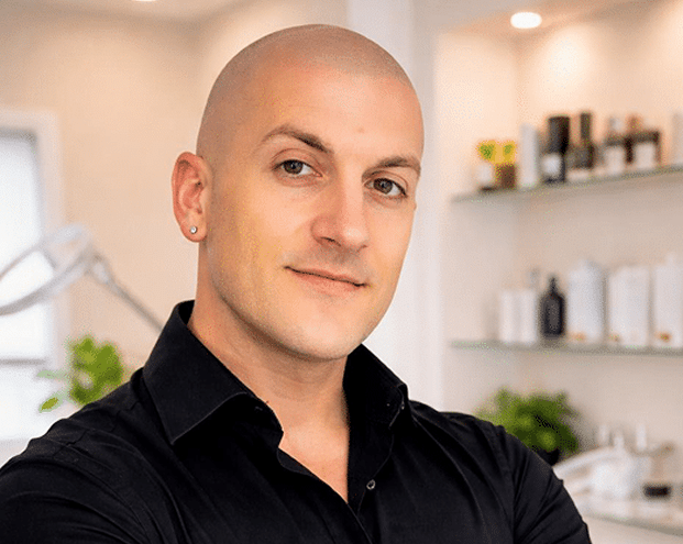 John Toti performing scalp micropigmentation at Scalp Designs in Boston